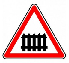 Panneau routier "Passage à niveau à barrières à fonctionnement manuel" A7